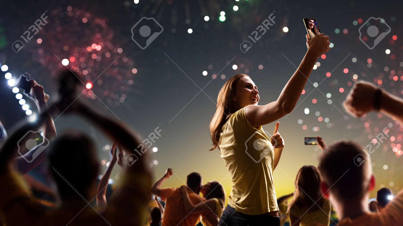 Fans celebrate in Stadium Arena night fireworks - 157466300 Fans celebrate in Stadium Arena night fireworks - 157466300