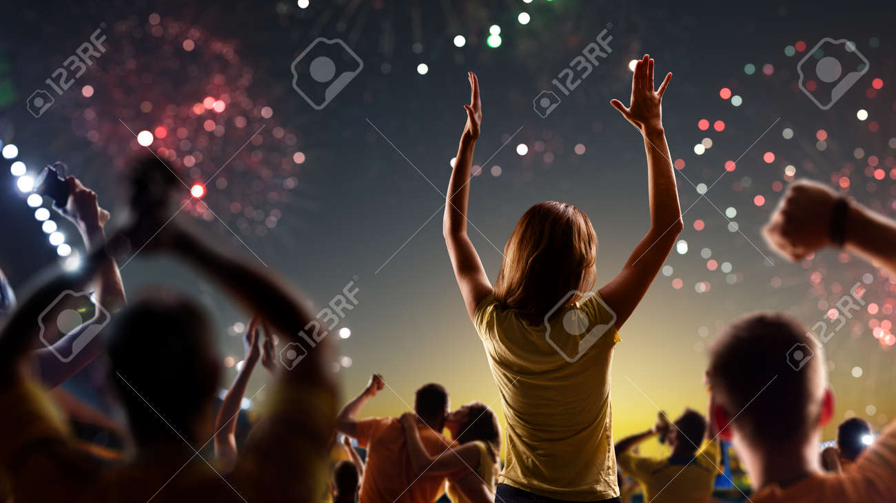 Fans celebrate in Stadium Arena night fireworks - 157291978 Fans celebrate in Stadium Arena night fireworks - 157291978