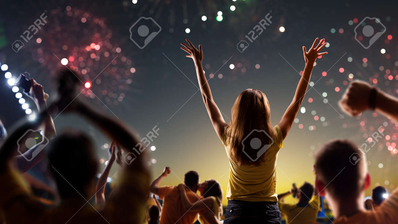 Fans celebrate in Stadium Arena night fireworks - 157292098 Fans celebrate in Stadium Arena night fireworks - 157292098