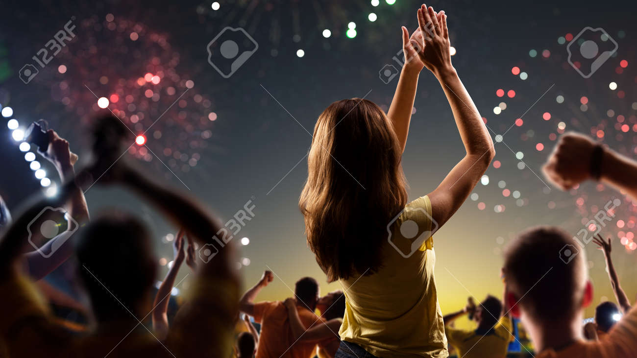 Fans celebrate in Stadium Arena night fireworks - 157291890 Fans celebrate in Stadium Arena night fireworks - 157291890