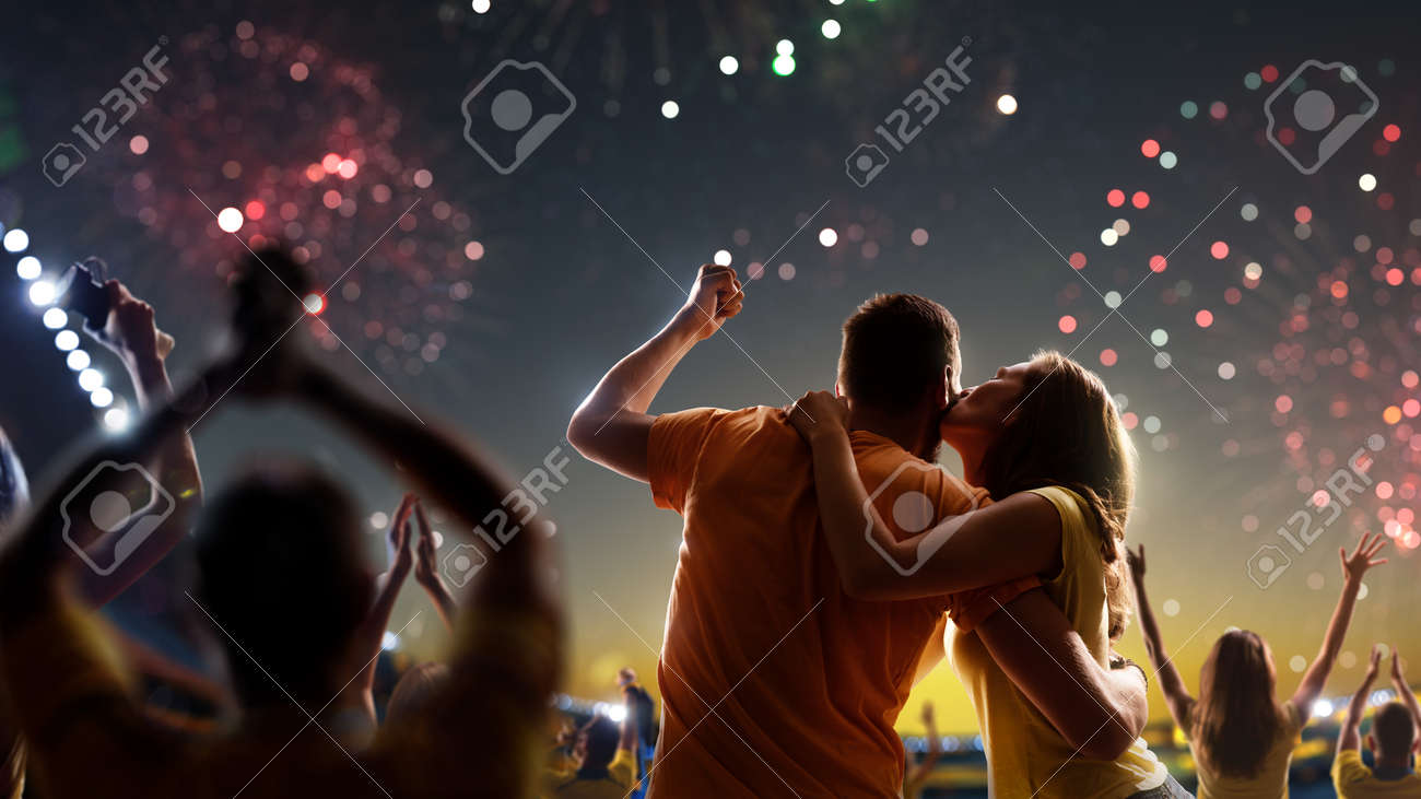 Fans celebrate in Stadium Arena night fireworks - 157252374 Fans celebrate in Stadium Arena night fireworks - 157252374