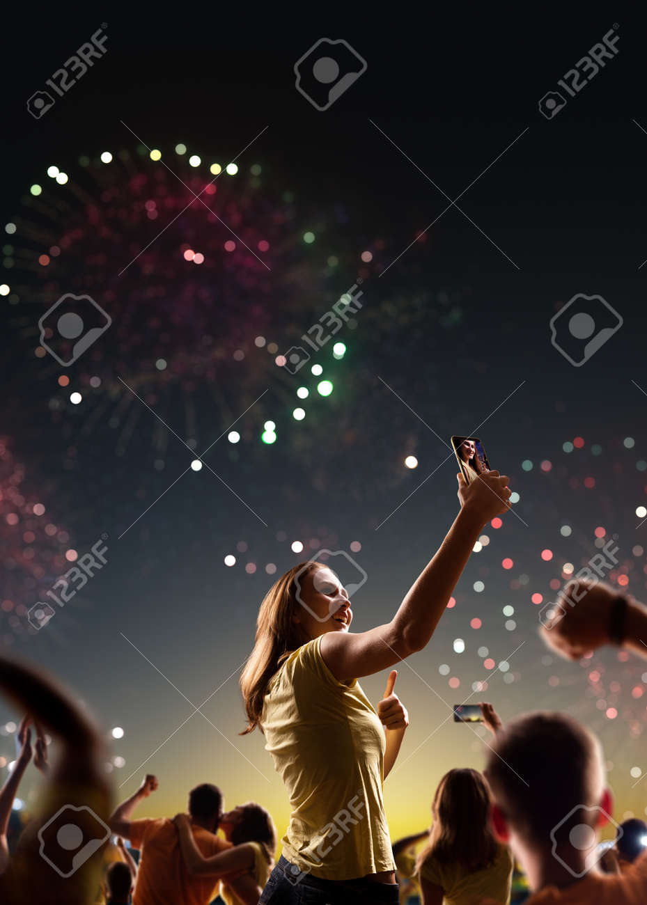 Fans celebrate in Stadium Arena night fireworks - 157291650 Fans celebrate in Stadium Arena night fireworks - 157291650
