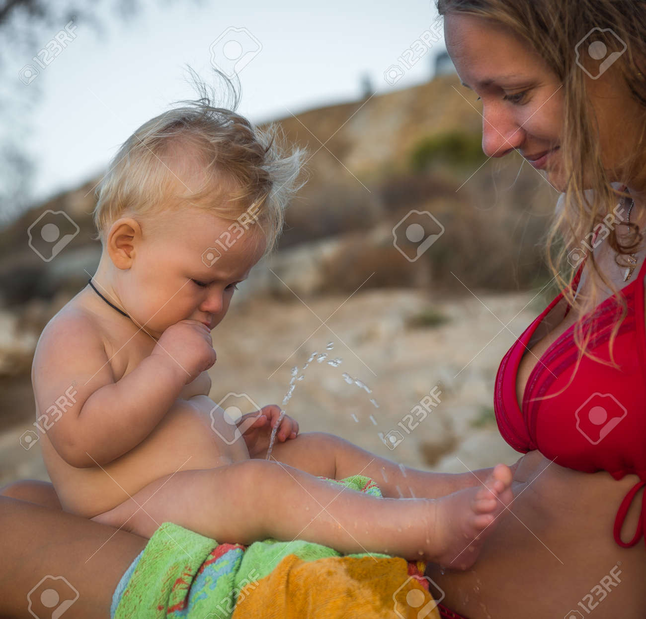 boy peeing on girl Image Of A Boy Peeing On His Mother On The Beach, Greece Stock Photo,  Picture and Royalty Free Image. Image 50777041.