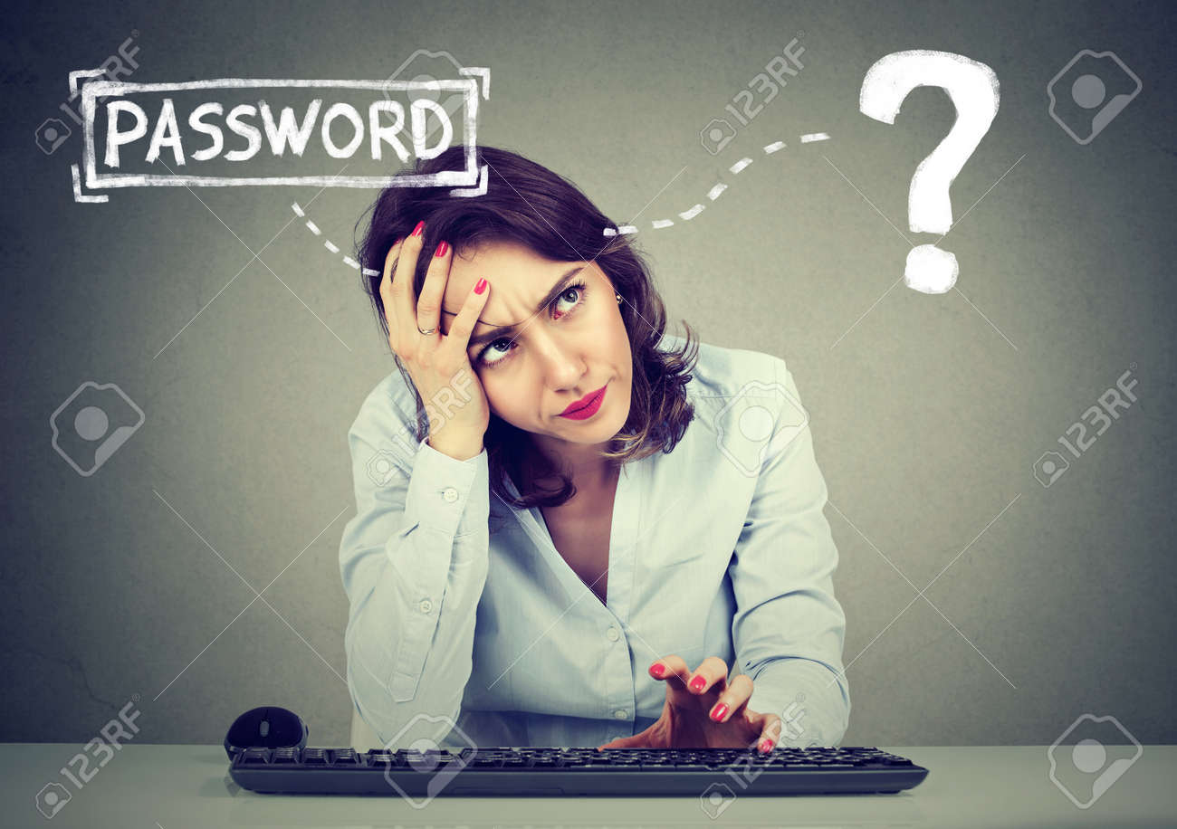 Desperate young woman trying to log into her computer forgot password - 82491798 Desperate young woman trying to log into her computer forgot password - 82491798