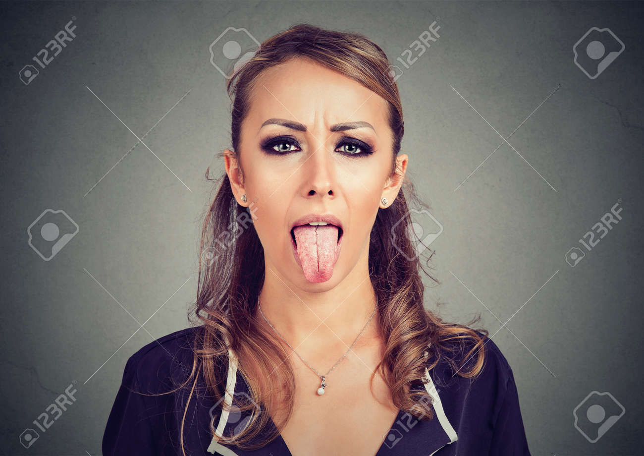 Closeup Portrait Of A Woman Sticking Her Tongue Out Stock Photo Picture And Royalty Free Image Image 87914947