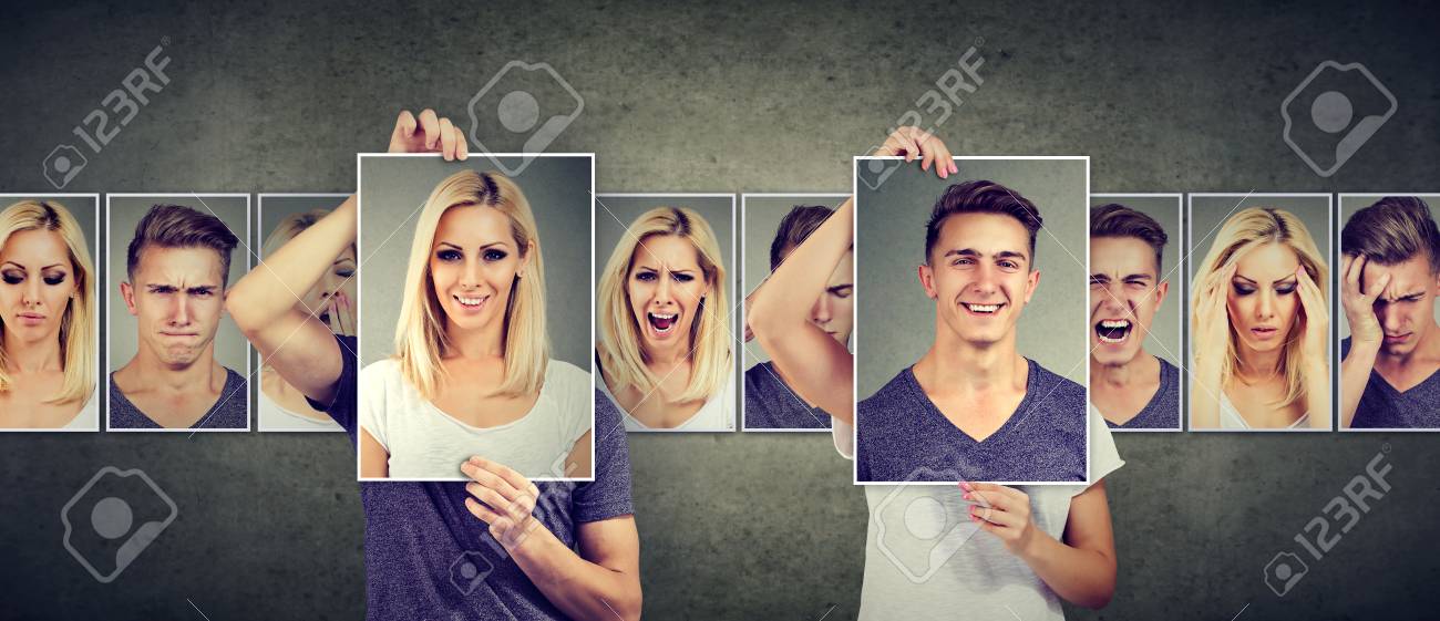 Balanced relationship concept. Masked woman and man expressing different emotions exchanging faces - 89546471 Balanced relationship concept. Masked woman and man expressing different emotions exchanging faces - 89546471