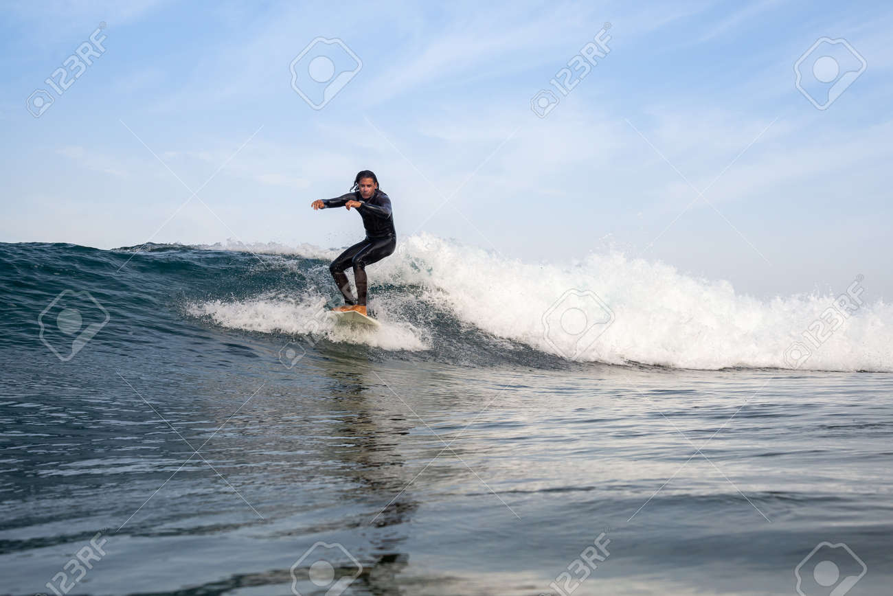 Surfer riding waves on the island of fuerteventura in the Atlantic Ocean, Canary Islands - 139118304 Surfer riding waves on the island of fuerteventura in the Atlantic Ocean, Canary Islands - 139118304