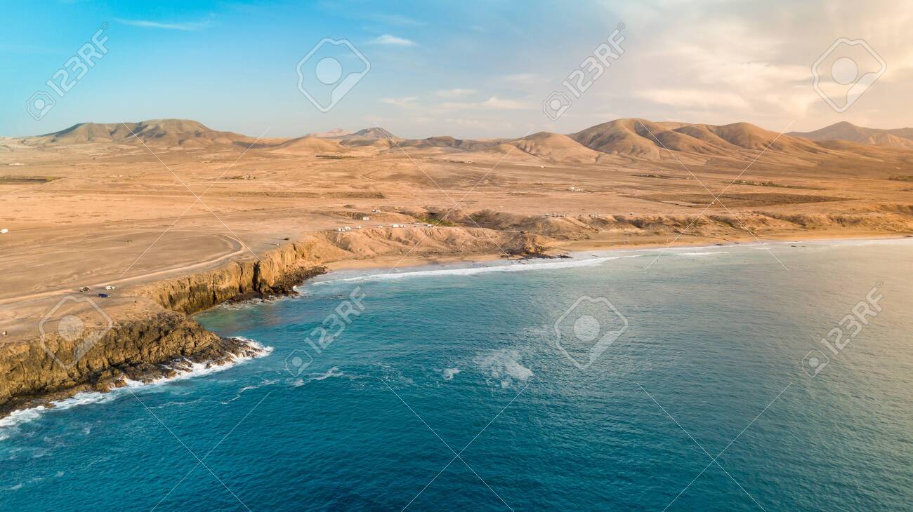 Aerial view west coast of Fuerteventura at sunset, canary islands - 139125323 Aerial view west coast of Fuerteventura at sunset, canary islands - 139125323