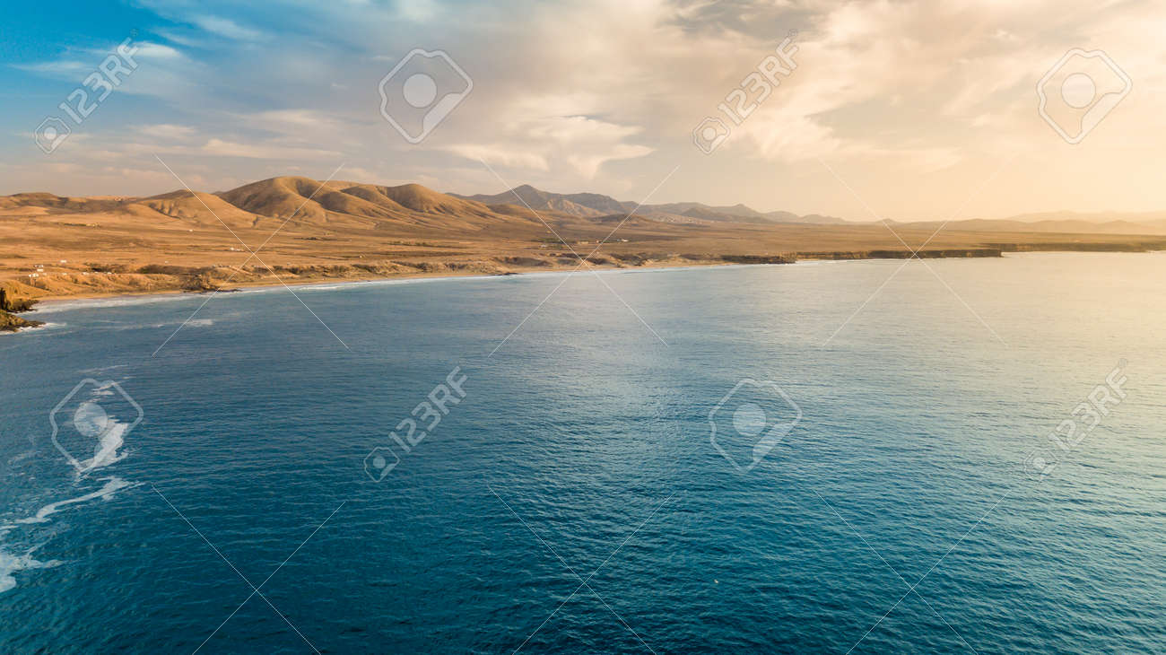 Aerial view west coast of Fuerteventura at sunset, canary islands - 139125356 Aerial view west coast of Fuerteventura at sunset, canary islands - 139125356