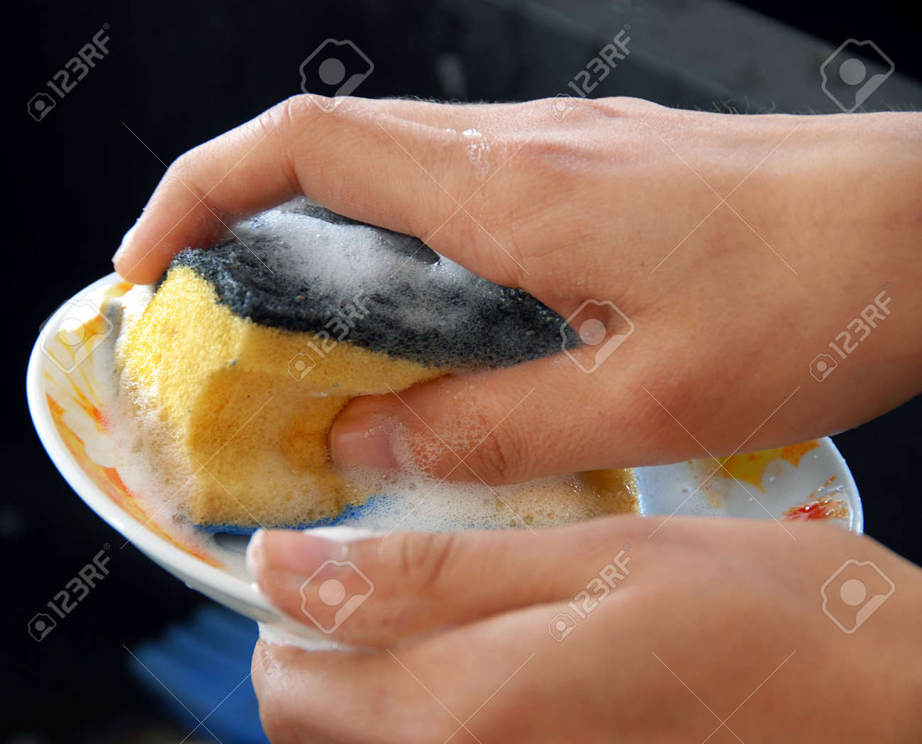Kitchen Sink With Clean Dishes hands with sponge washing dishes in kitchen sink stock photo Kitchen Sink With Clean Dishes hands with sponge washing dishes in kitchen sink stock photo
