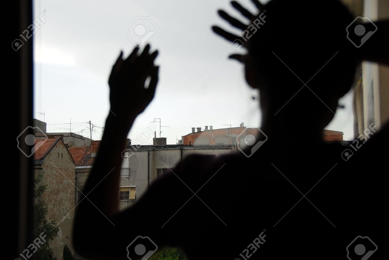 woman black silhouette looking out window indoors, with hands on glass - 14548598 woman black silhouette looking out window indoors, with hands on glass - 14548598