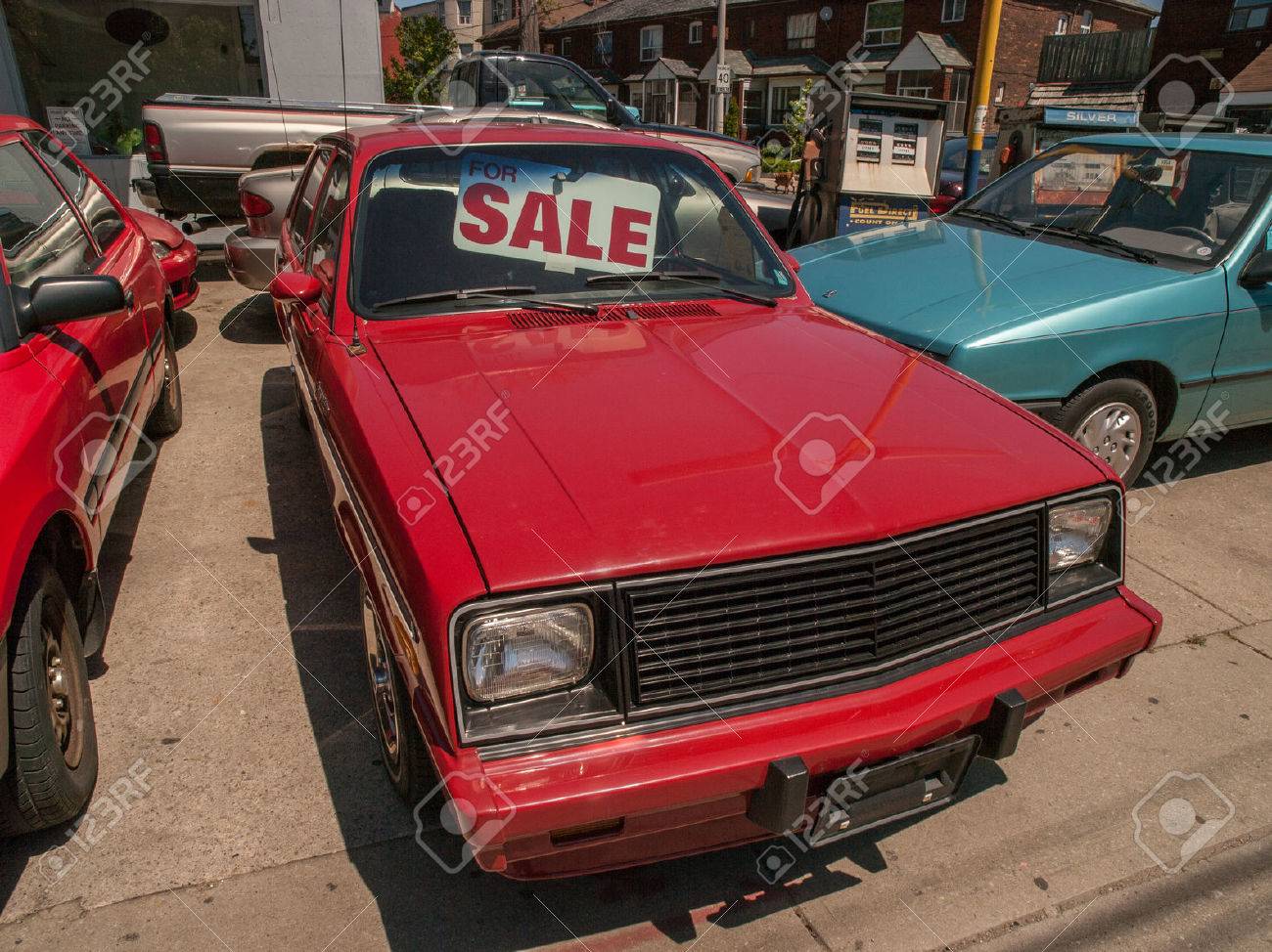 Buy Used Cars Toronto >> Old Red Hatchback Car For Sale In A Used Car Lot In Toronto Ontario Buy Used Cars Toronto >> Old Red Hatchback Car For Sale In A Used Car Lot In Toronto Ontario