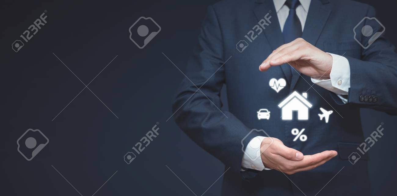Agent in suit on insurance concept. Home, health, car, travel, finance safety - 125165176 Agent in suit on insurance concept. Home, health, car, travel, finance safety - 125165176