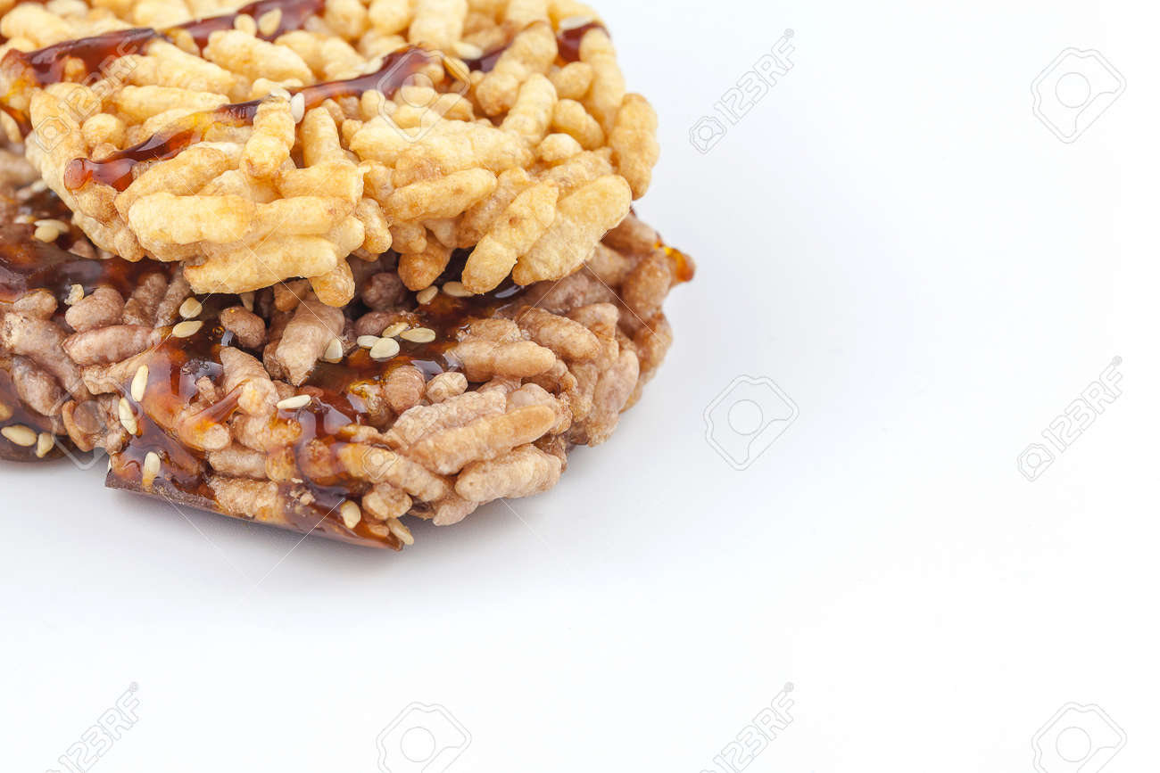 thai rice snack called rice taen with caramel on white background - 71018106 thai rice snack called rice taen with caramel on white background - 71018106