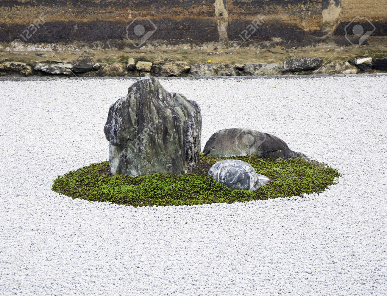 stock photo zen rock garden in ryoanji temple in a garden fifteen stones on white gravel kyoto japan - Zen Rock Garden stock photo zen rock garden in ryoanji temple in a garden fifteen stones on white gravel kyoto japan - Zen Rock Garden