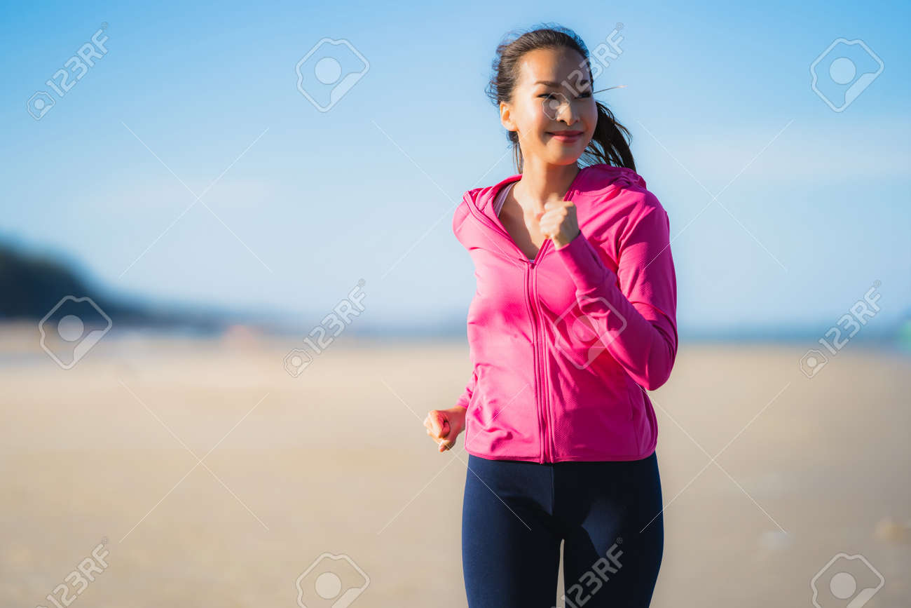 Portrait beautiful young asian woman running or exercise on the tropica nature landscape of beach sea ocean for healthy concept - 122456157 Portrait beautiful young asian woman running or exercise on the tropica nature landscape of beach sea ocean for healthy concept - 122456157