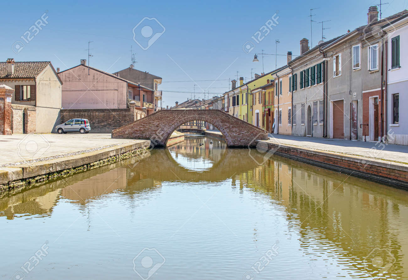 Comacchio, Italy - often compared to Venice for the canals and the architecture, Comacchio displays one of the most characteristic old towns in Emilia Romagna - 170448993 Comacchio, Italy - often compared to Venice for the canals and the architecture, Comacchio displays one of the most characteristic old towns in Emilia Romagna - 170448993