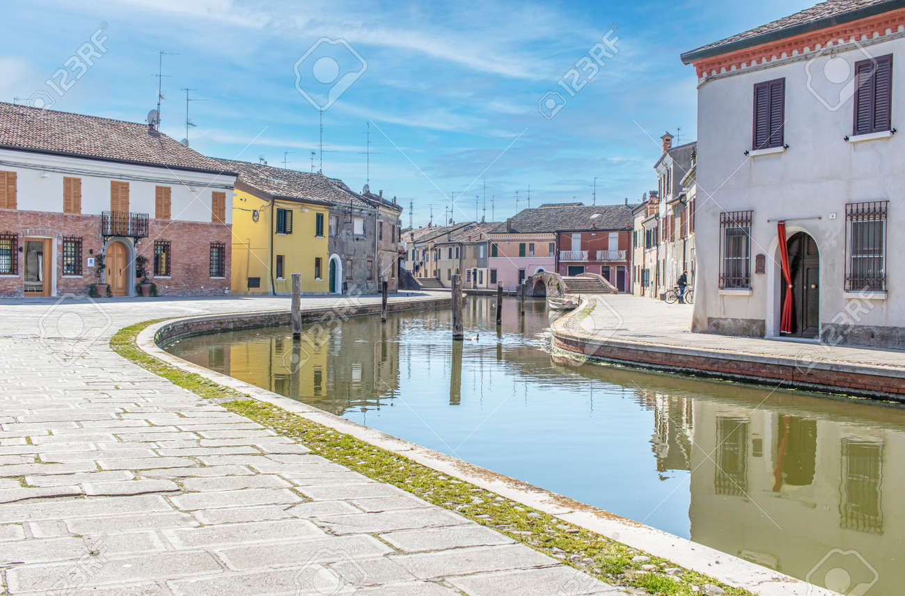 Comacchio, Italy - often compared to Venice for the canals and the architecture, Comacchio displays one of the most characteristic old towns in Emilia Romagna - 170490483 Comacchio, Italy - often compared to Venice for the canals and the architecture, Comacchio displays one of the most characteristic old towns in Emilia Romagna - 170490483