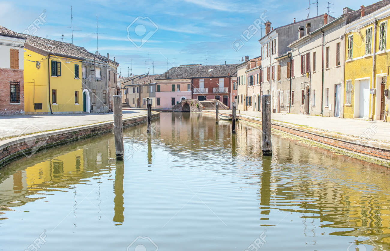 Comacchio, Italy - often compared to Venice for the canals and the architecture, Comacchio displays one of the most characteristic old towns in Emilia Romagna - 170449073 Comacchio, Italy - often compared to Venice for the canals and the architecture, Comacchio displays one of the most characteristic old towns in Emilia Romagna - 170449073