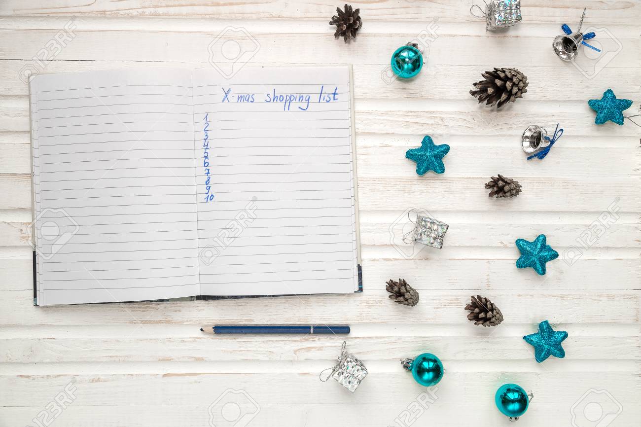Christmas Shopping List On White Wooden Background Holiday