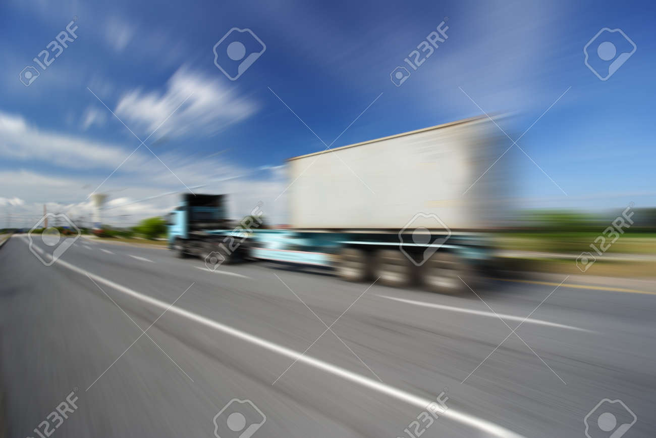 Generic big trucks speeding on the highway at sunset - Transport industry concept , big truck containers - 45173026 Generic big trucks speeding on the highway at sunset - Transport industry concept , big truck containers - 45173026
