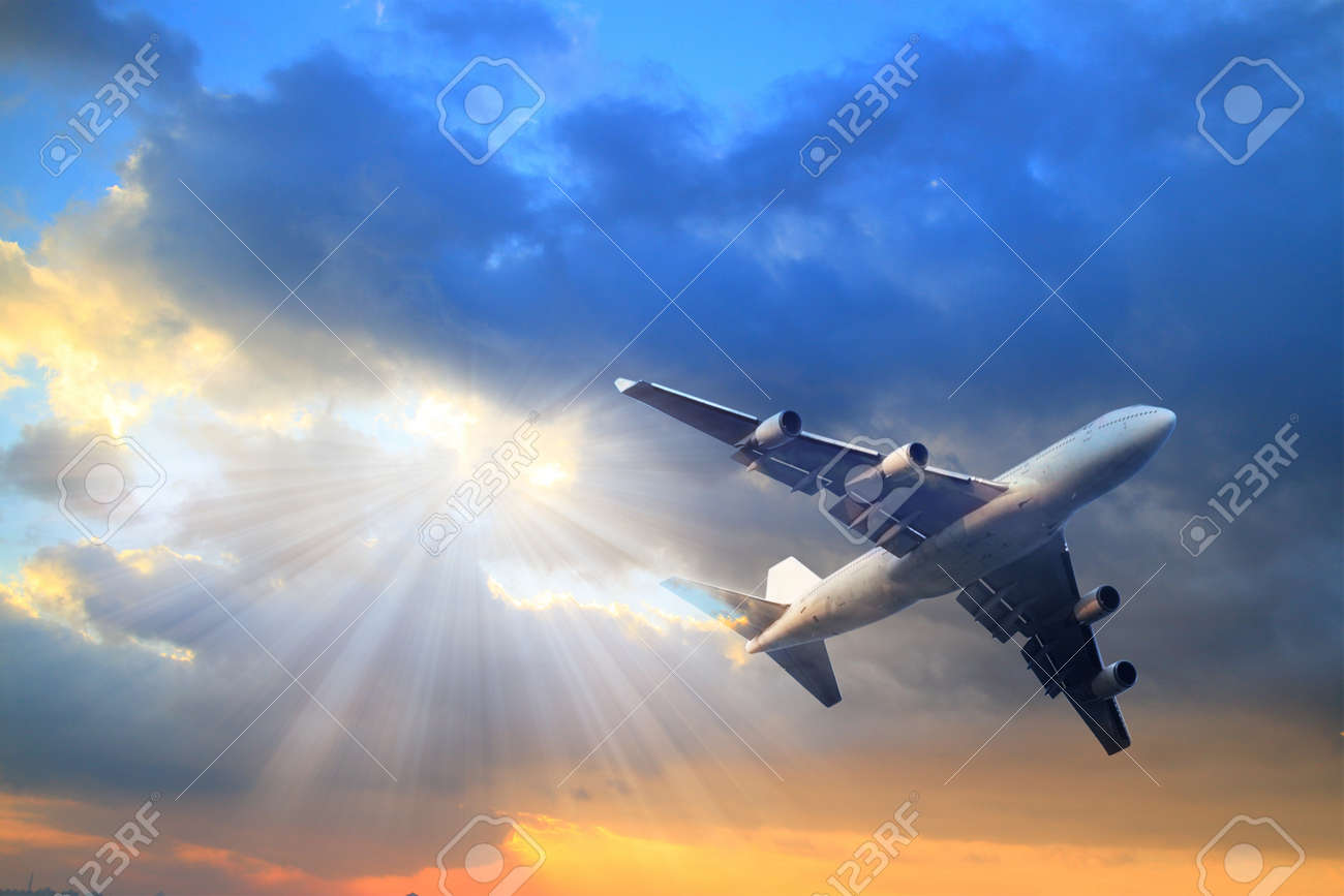 passenger airplane in the clouds. travel by air transport - 47476698 passenger airplane in the clouds. travel by air transport - 47476698
