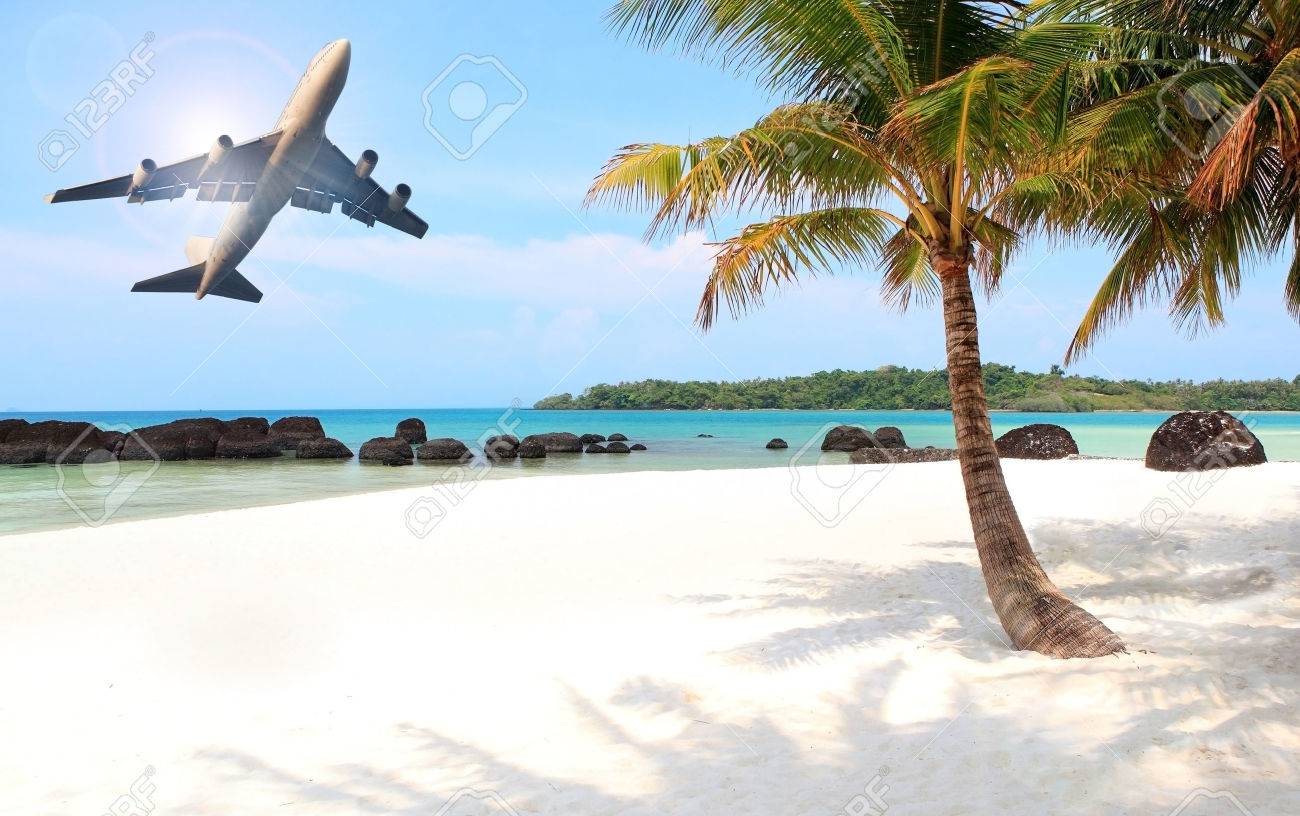 passenger plane flying over beautiful blue ocean and island in purity destination sea beach use for summer holiday vacation traveling - 47866538 passenger plane flying over beautiful blue ocean and island in purity destination sea beach use for summer holiday vacation traveling - 47866538
