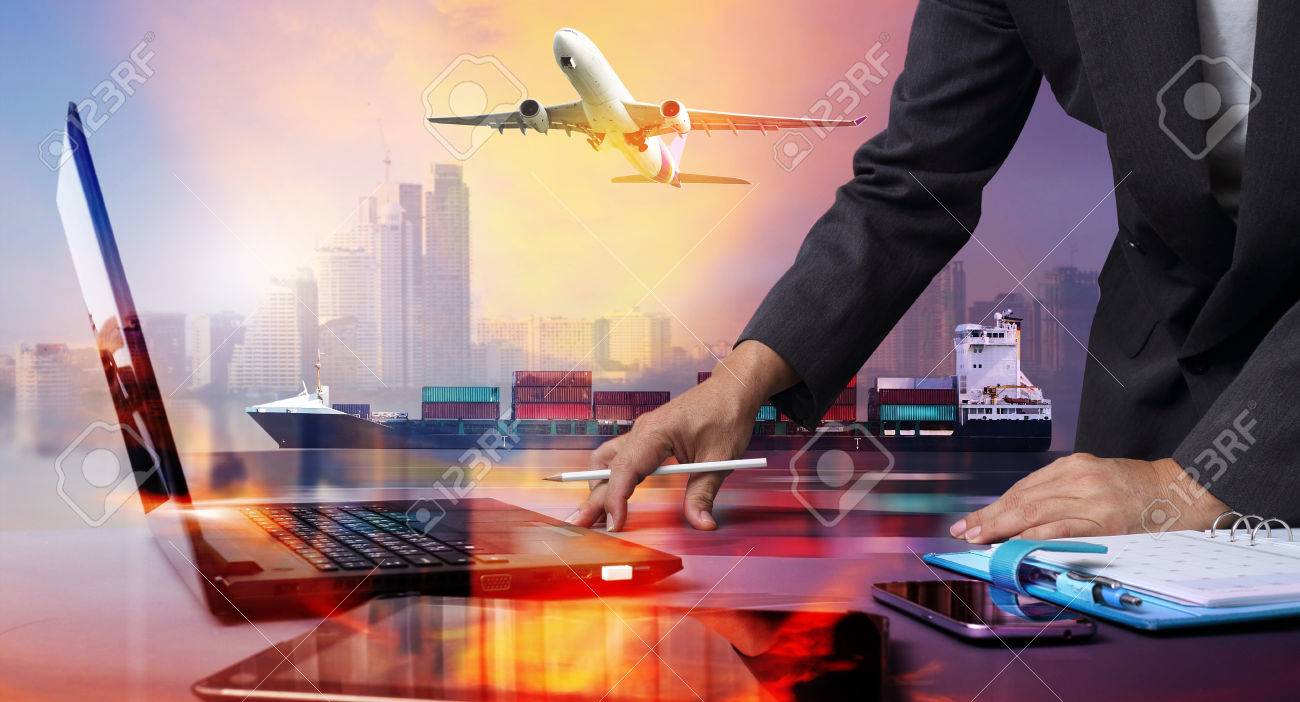 businessman working with Container Cargo ship and Cargo plane with big city in seaport , logistic import export background and transport industry. - 65198834 businessman working with Container Cargo ship and Cargo plane with big city in seaport , logistic import export background and transport industry. - 65198834