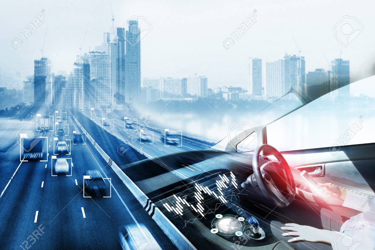 electric car or intelligent car.Heads up display(HUD).futuristic vehicle and graphical user interface(GUI).self-driving mode , autonomous car, vehicle running self driving mode and a woman driver - 94249211 electric car or intelligent car.Heads up display(HUD).futuristic vehicle and graphical user interface(GUI).self-driving mode , autonomous car, vehicle running self driving mode and a woman driver - 94249211