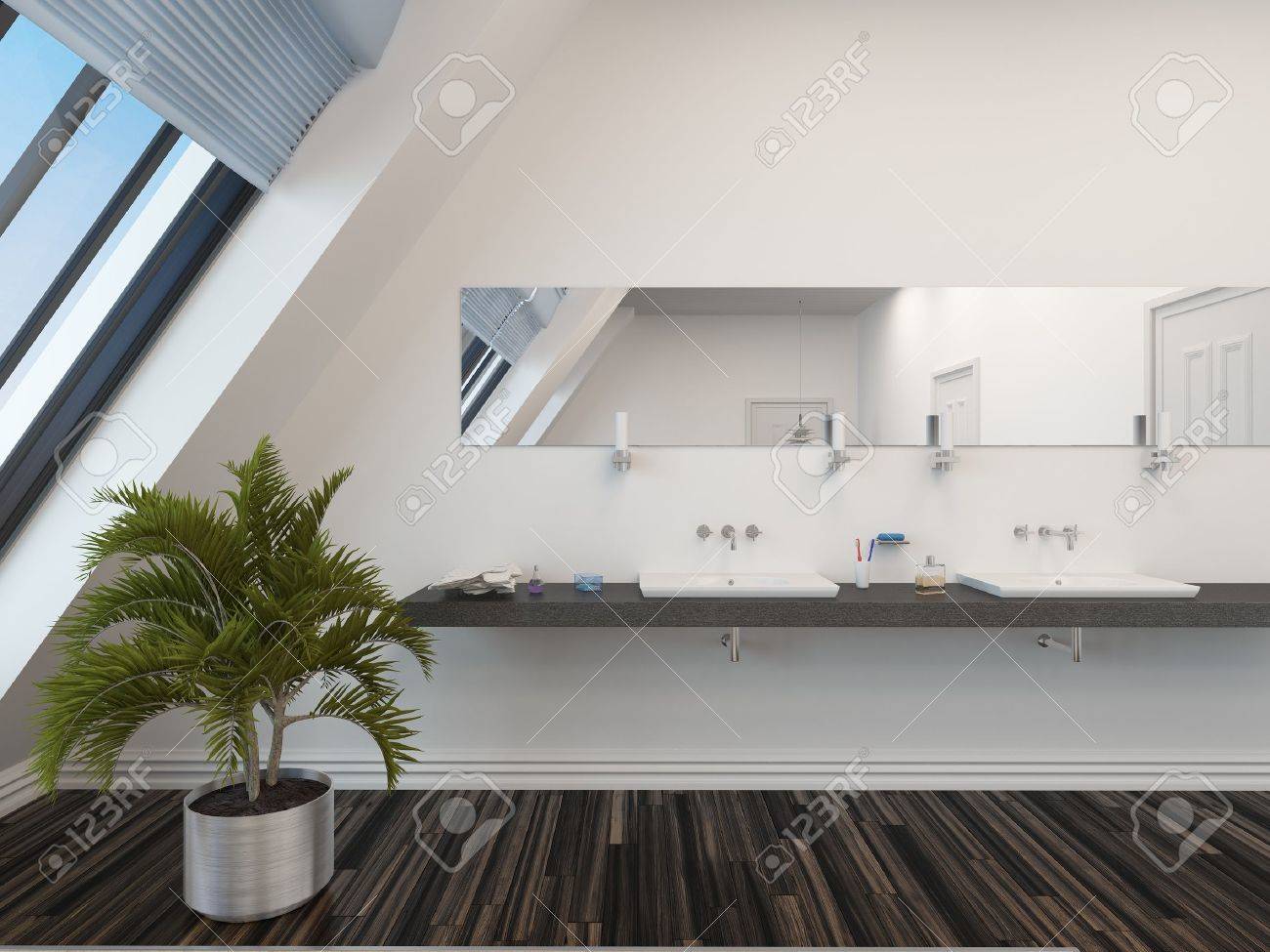 moderno bagno con doppio lavandino sotto un lungo specchio