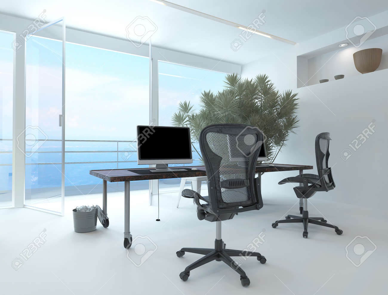 Modern Waterfront Office Interior With A Computer Workstation And Chairs In Front Of Large Floor