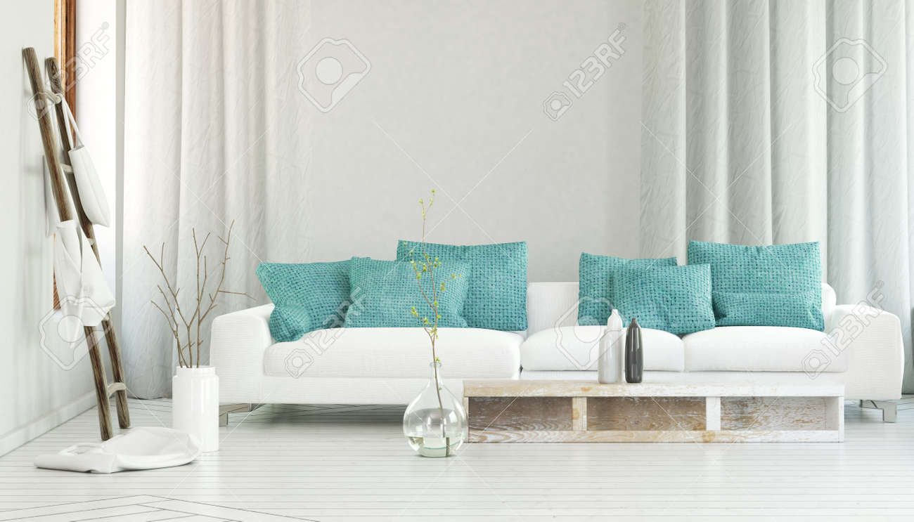 wide white sofa decoratedturquoise colored pillows in between wide white sofa decoratedturquoise colored pillows in between