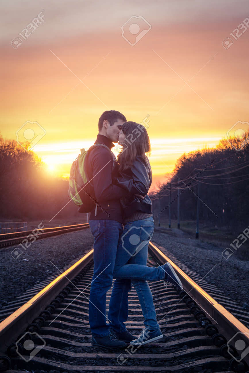 Featured image of post Romantic Couples Kissing In The Sunset - Romantic couple in love kissing on the beach during sunset, backlit scene.