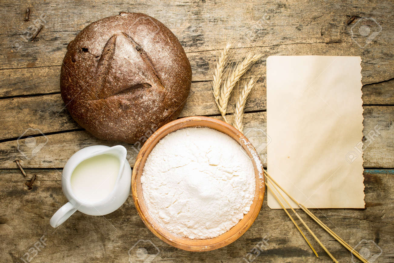 bakery recipe background loaf of rye bread with ingredients stock