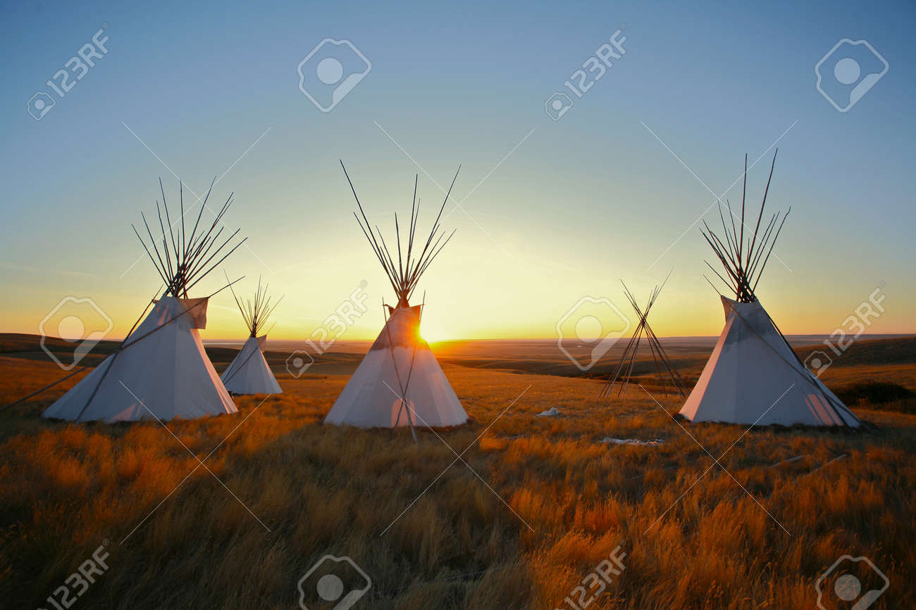 Tipis on the prairie at sunrise - 11617143 Tipis on the prairie at sunrise - 11617143