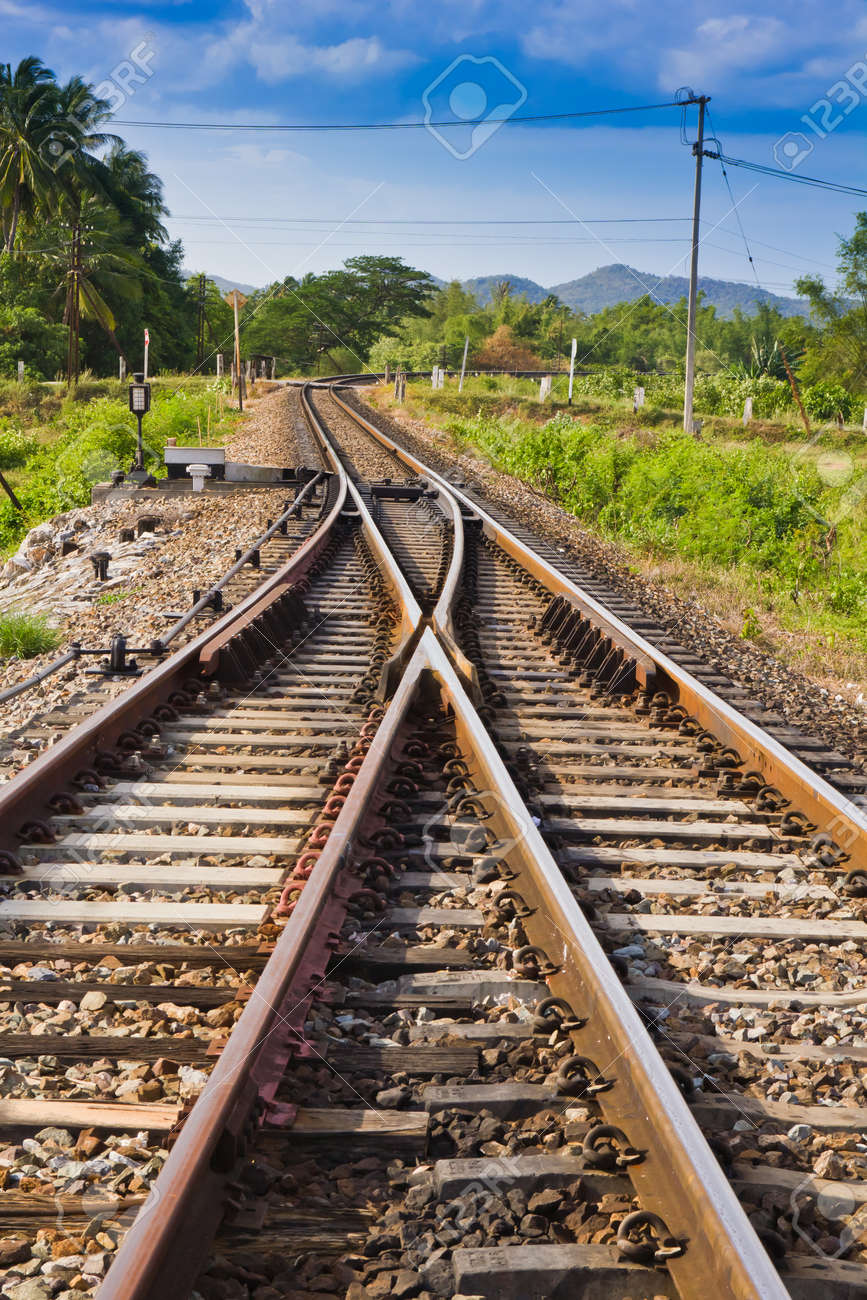 curve railway track with mountain background stock photo picture