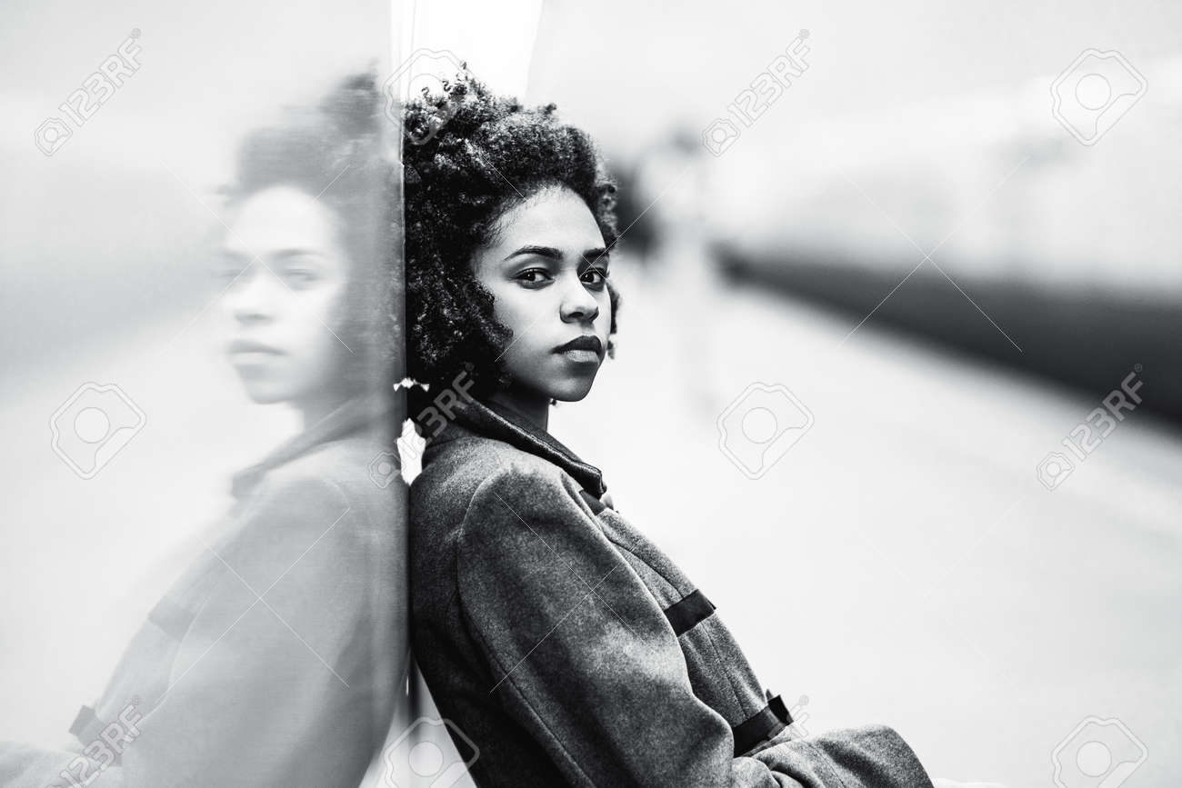 Black and white portrait of charming african american female