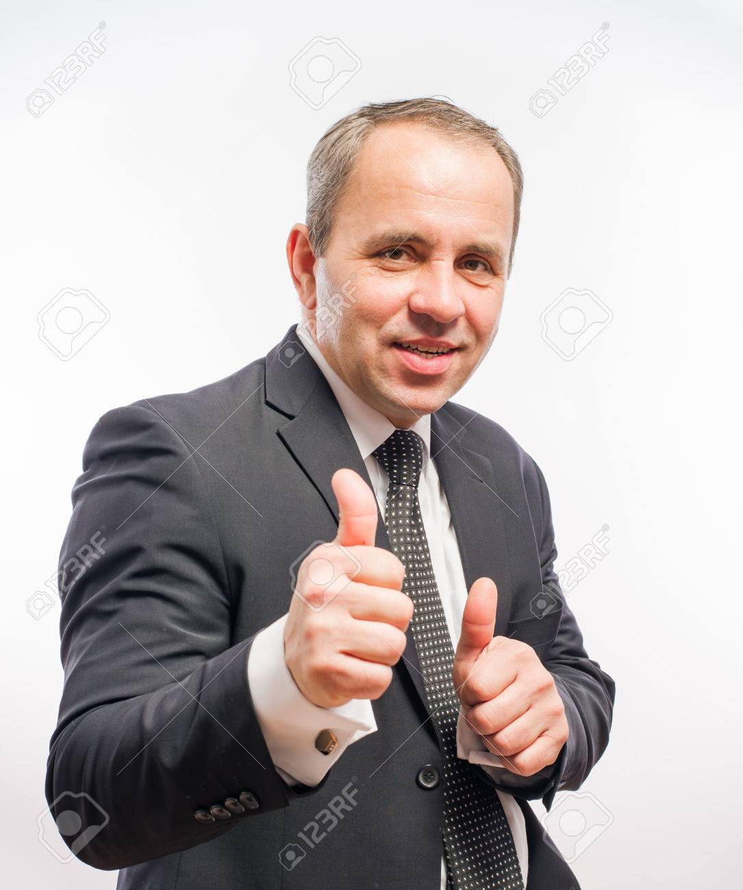 34617651-happy-business-man-holding-thumbs-up.jpg