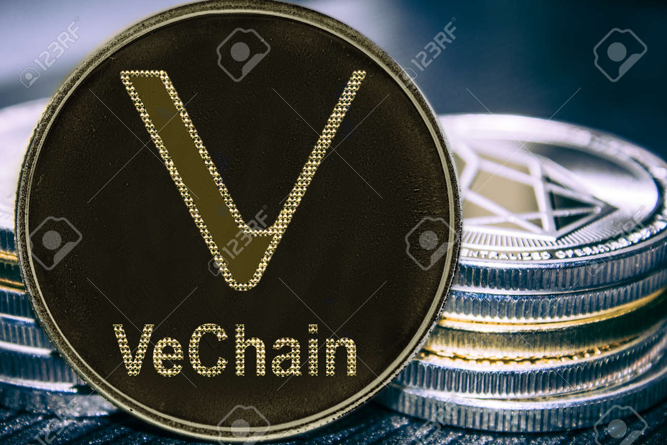 Coin Cryptocurrency Vechain On The Background Of A Stack Of Coins Vet Coin Stock Photo Picture And Royalty Free Image Image 126055820