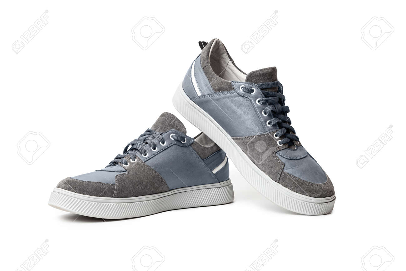 Blue casual sports shoes, sneaker isolated on a white background - 170242764 Blue casual sports shoes, sneaker isolated on a white background - 170242764