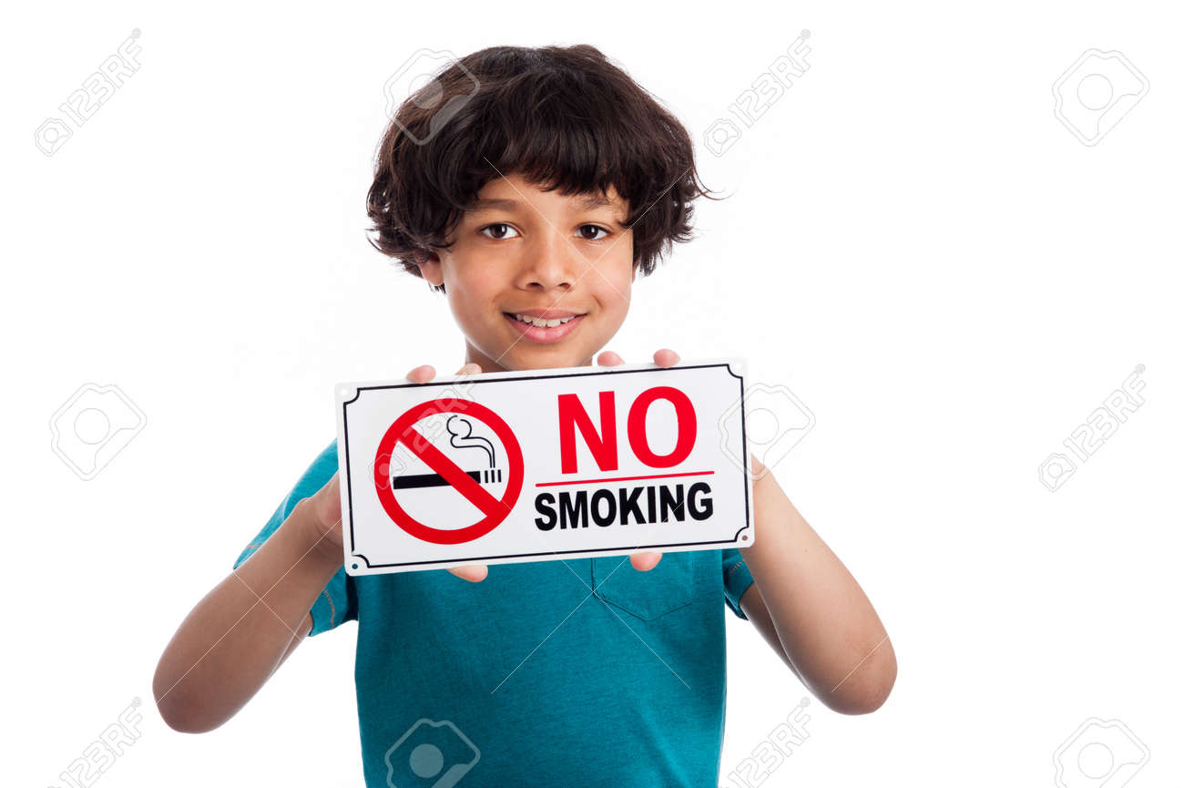Cute mixed race kid holding no smoking sign. Isolated on white background. - 20824692 Cute mixed race kid holding no smoking sign. Isolated on white background. - 20824692