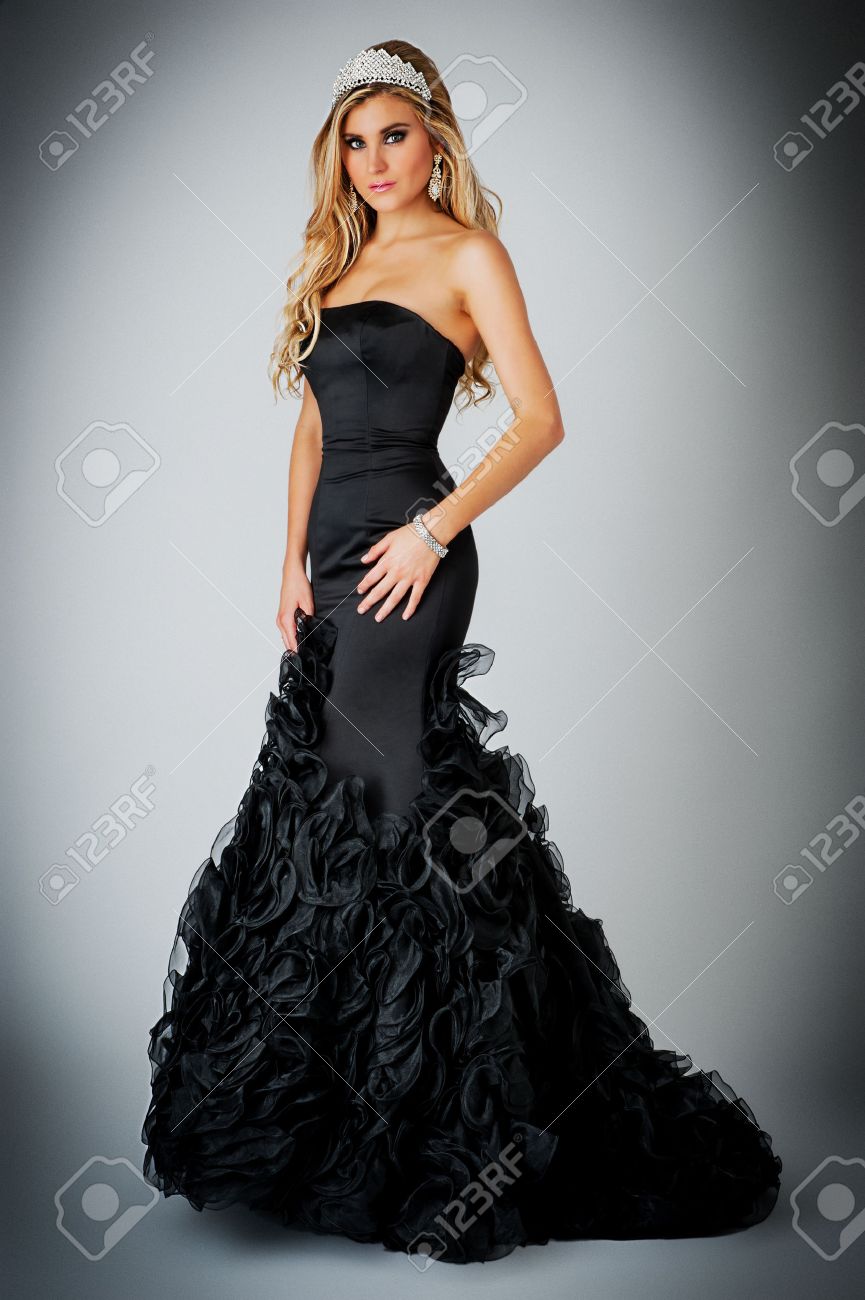 Glamourous woman wearing a tiara and ball gown - 26785006 Glamourous woman wearing a tiara and ball gown - 26785006
