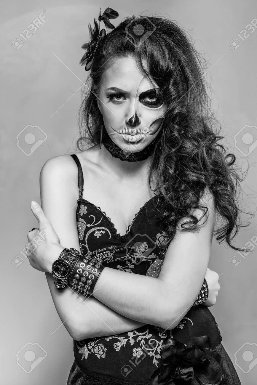 Young Woman In Black With Half Face Skull Make Up Stock Photo Picture And Royalty Free Image Image