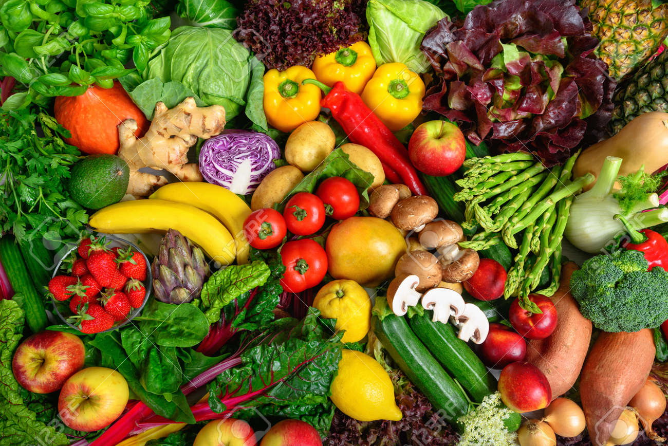 Pile of fruits and vegetables in many appetizing colors, shot from above, inviting to lead a healthy plant-based lifestyle and self-care - 150180855 Pile of fruits and vegetables in many appetizing colors, shot from above, inviting to lead a healthy plant-based lifestyle and self-care - 150180855