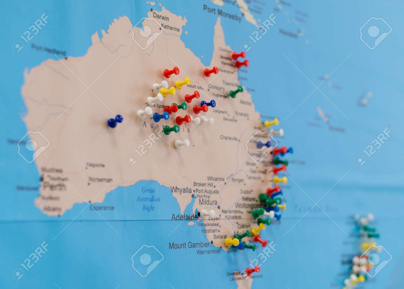 buttons on australia on the world map soft focus austrailian world map