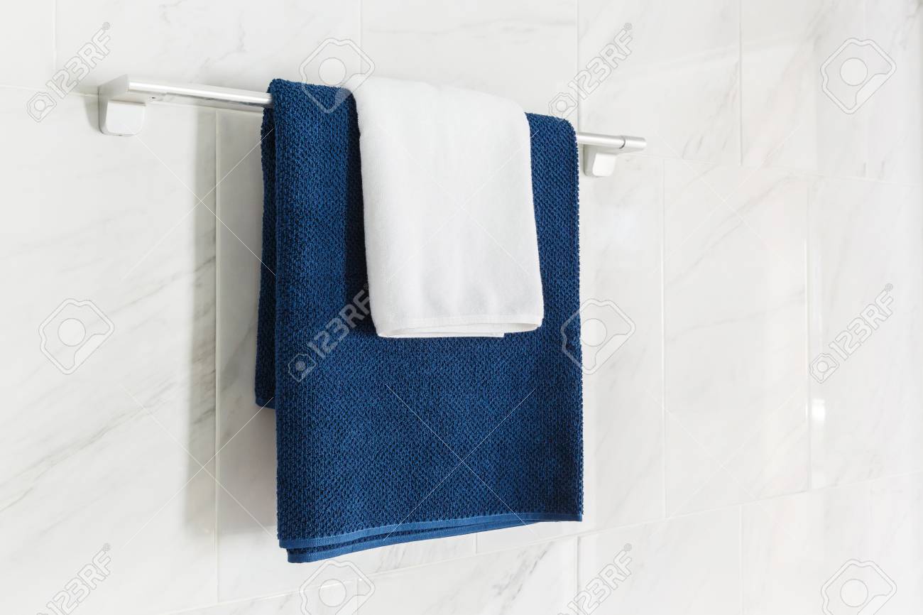 Close Up Blue And White Color Towels Hanging On Towel Bar In Stock Photo Picture And Royalty Free Image Image 75730746
