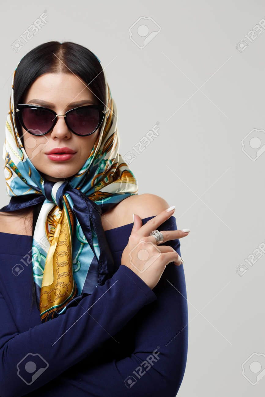 headscarf and sunglasses