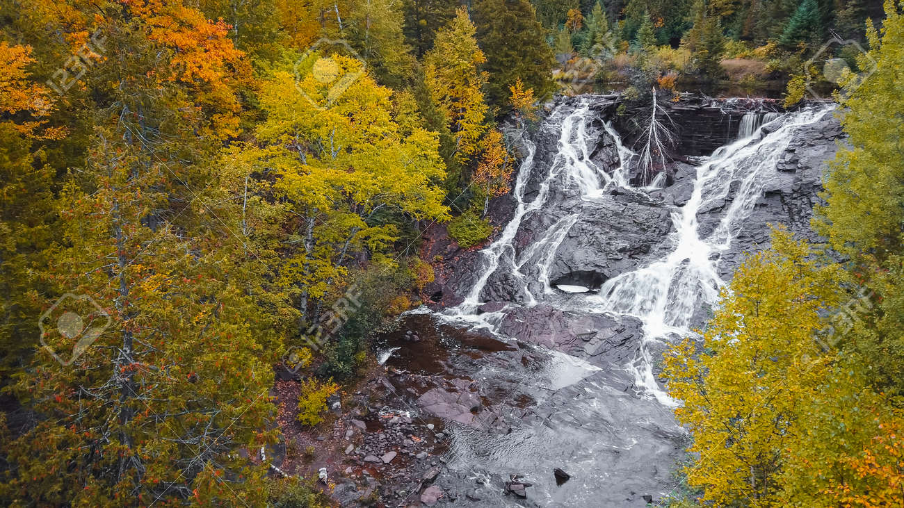 Eagle river falls in Keweenaw peninsula in Michigan upper peninsula during autumn time. - 164161348 Eagle river falls in Keweenaw peninsula in Michigan upper peninsula during autumn time. - 164161348