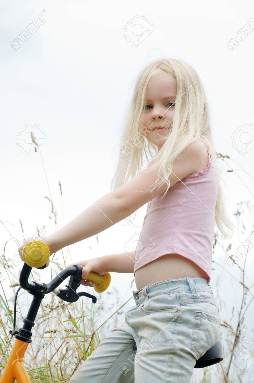 little girl on bicycle