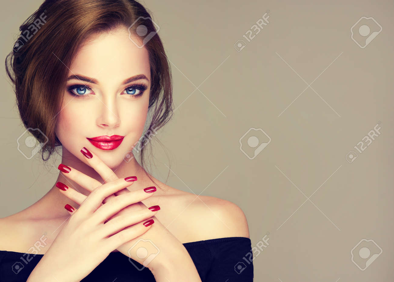 Portrait of young, brown haired beautiful woman with long, well groomed hair gathered in elegant evening hairstyle. Hairdressing art, hair care and beauty products. - 107197327 Portrait of young, brown haired beautiful woman with long, well groomed hair gathered in elegant evening hairstyle. Hairdressing art, hair care and beauty products. - 107197327